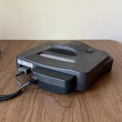 LOT 114F: Nintendo NES Control Deck Model NES-001 w/ 3 Model NES-004 Controllers & Nintendo 64 Control Deck NVS-001
