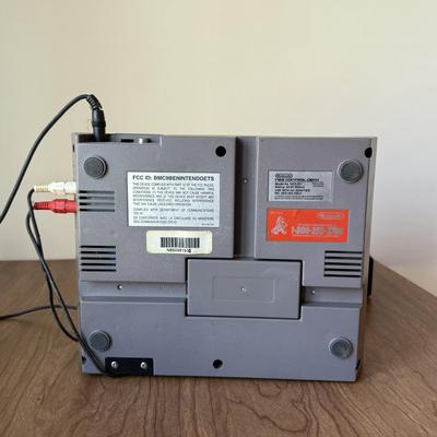 LOT 114F: Nintendo NES Control Deck Model NES-001 w/ 3 Model NES-004 Controllers & Nintendo 64 Control Deck NVS-001