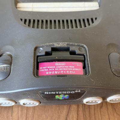 LOT 114F: Nintendo NES Control Deck Model NES-001 w/ 3 Model NES-004 Controllers & Nintendo 64 Control Deck NVS-001