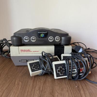 LOT 114F: Nintendo NES Control Deck Model NES-001 w/ 3 Model NES-004 Controllers & Nintendo 64 Control Deck NVS-001