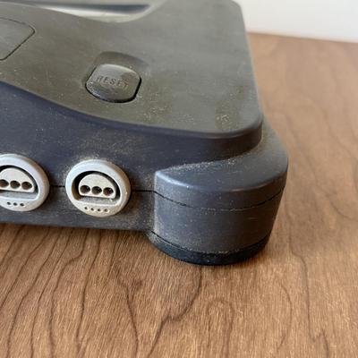 LOT 114F: Nintendo NES Control Deck Model NES-001 w/ 3 Model NES-004 Controllers & Nintendo 64 Control Deck NVS-001