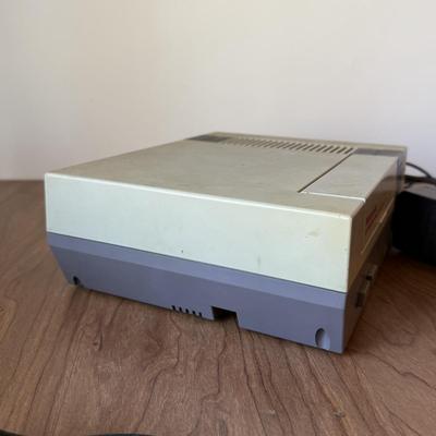 LOT 114F: Nintendo NES Control Deck Model NES-001 w/ 3 Model NES-004 Controllers & Nintendo 64 Control Deck NVS-001