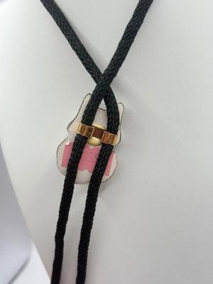LOT 190J: Two Painted Clay Cat Bolo Ties