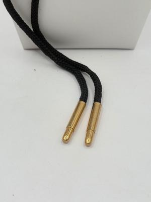 LOT 190J: Two Painted Clay Cat Bolo Ties
