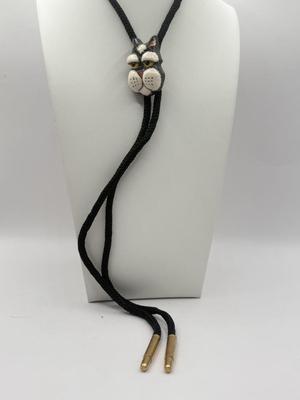 LOT 190J: Two Painted Clay Cat Bolo Ties