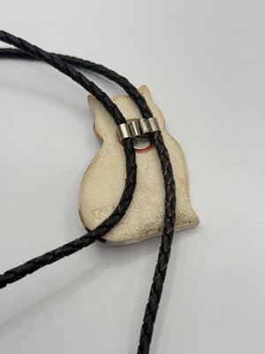LOT 190J: Two Painted Clay Cat Bolo Ties