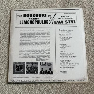 LOT 223L: Collection of Vintage & Promotional Copy Records: Eddie Murphy, REO Speedwagon, Neil Diamond & More