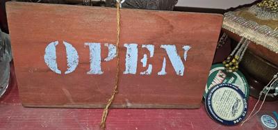 Hand painted sign "Open" and "Nope"