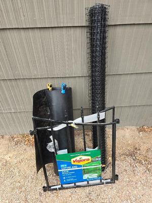 Brand new Vigoro Empire and Westrbrook Garden gate a roll of mesh barrier and a black plastic with handle