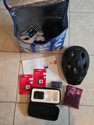 GoPro with Mongoose CM303 Helmet and accessories including two 64 GB UHS scandisk media storage cards