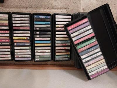 LARGE COLLECTION OF CASSETTS AND GE CASSETE PLAYER/RECORDER.