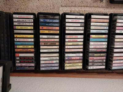 LARGE COLLECTION OF CASSETTS AND GE CASSETE PLAYER/RECORDER.
