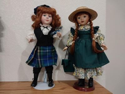 TWO PORCELAIN DOLLS