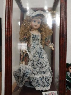 COLLECTABLE DOLL IN DISPLAY CASE