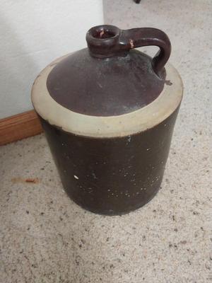 TWO VINTAGE CLAY JUGS