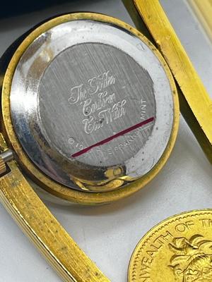 LOT 7: Franklin Mint Goldtone Golden Caribbean 22K Electroplated "1987" Coin Bangle Watch