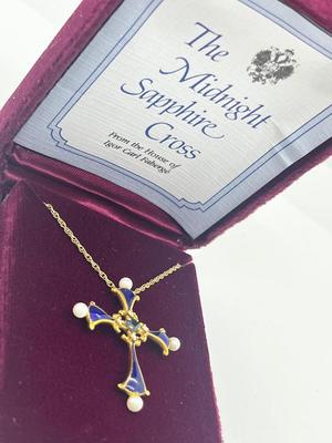 LOT 11: "The Midnight Sapphire" - 14K Yellow Gold, Diamond, Sapphire and Pearl Enameled Cross from the House of Igor Carol Faberge