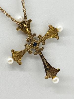LOT 11: "The Midnight Sapphire" - 14K Yellow Gold, Diamond, Sapphire and Pearl Enameled Cross from the House of Igor Carol Faberge