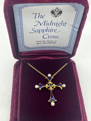 LOT 11: "The Midnight Sapphire" - 14K Yellow Gold, Diamond, Sapphire and Pearl Enameled Cross from the House of Igor Carol Faberge