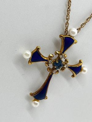 LOT 11: "The Midnight Sapphire" - 14K Yellow Gold, Diamond, Sapphire and Pearl Enameled Cross from the House of Igor Carol Faberge