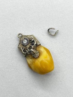 LOT 57: Antique Deer Tooth Pendant - Marked 10K On Loop