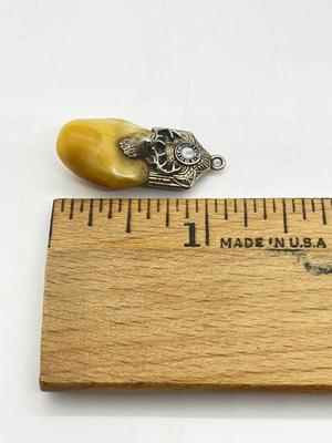 LOT 57: Antique Deer Tooth Pendant - Marked 10K On Loop