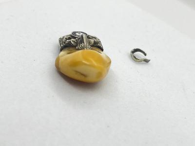 LOT 57: Antique Deer Tooth Pendant - Marked 10K On Loop