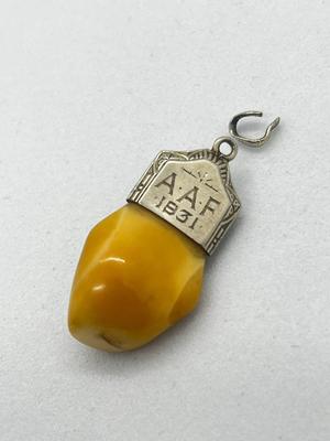 LOT 57: Antique Deer Tooth Pendant - Marked 10K On Loop