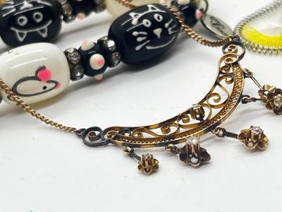 LOT 59: Assorted Treasures: Czech Art Glass "Dragon's Breath" Bracelet, Handpainted Wooden Box, 1904 Penny and Much More!