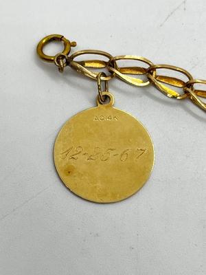 LOT 86: 14K Yellow Gold Charm Bracelet and Vintage Charms - 12.46 GTW