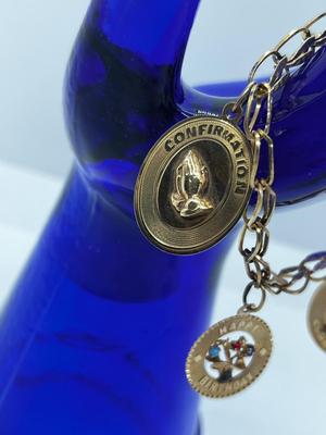 LOT 86: 14K Yellow Gold Charm Bracelet and Vintage Charms - 12.46 GTW
