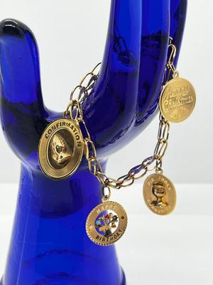 LOT 86: 14K Yellow Gold Charm Bracelet and Vintage Charms - 12.46 GTW