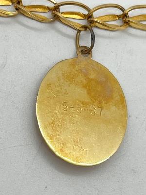 LOT 86: 14K Yellow Gold Charm Bracelet and Vintage Charms - 12.46 GTW
