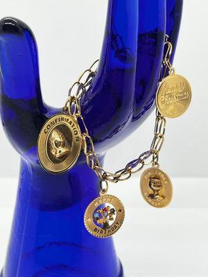LOT 86: 14K Yellow Gold Charm Bracelet and Vintage Charms - 12.46 GTW