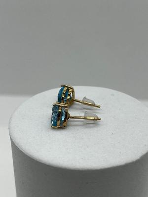LOT 87: 14K Yellow Gold and Blue Topaz Pierced Earrings - 1.52 GTW