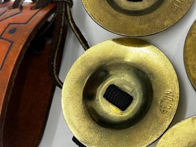 LOT 102: Finger Cymbals and Unique Leather Bracelet