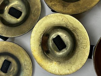 LOT 102: Finger Cymbals and Unique Leather Bracelet