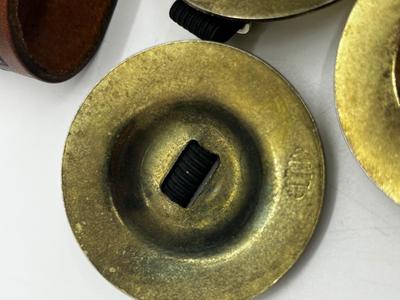 LOT 102: Finger Cymbals and Unique Leather Bracelet