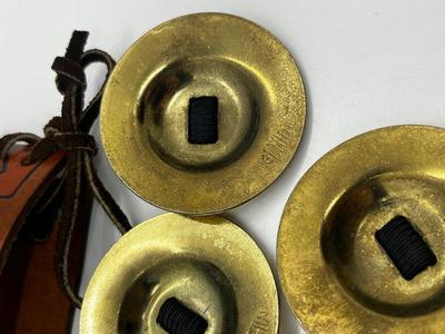 LOT 102: Finger Cymbals and Unique Leather Bracelet