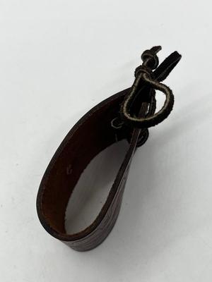 LOT 102: Finger Cymbals and Unique Leather Bracelet