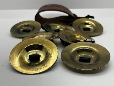 LOT 102: Finger Cymbals and Unique Leather Bracelet