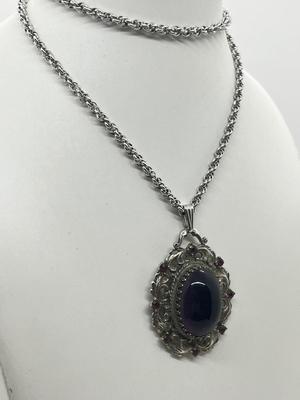 LOT 134: Magnificent Moody Pendant On 20" Chain