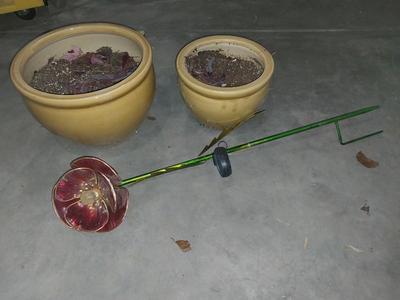TWO CERAMIC POTS AND SOLAR FLOWER