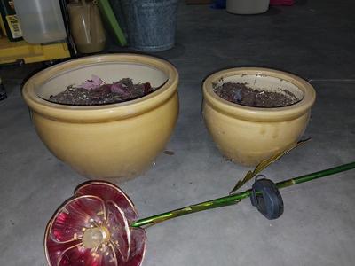 TWO CERAMIC POTS AND SOLAR FLOWER