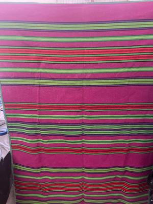 Pendleton blanket has lots of animal hair on it