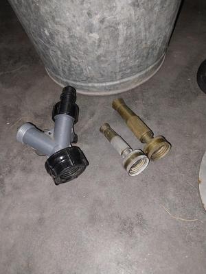 TWO GALVANIZED BUCKETS-HOSE SPRAYERS -PRUNERS AND WATER MEASUREING