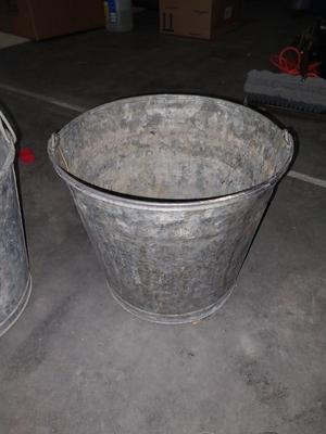 TWO GALVANIZED BUCKETS-HOSE SPRAYERS -PRUNERS AND WATER MEASUREING