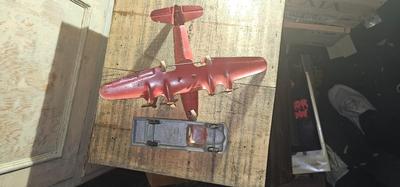 Vintage pressed metal toy truck and Marx airplane