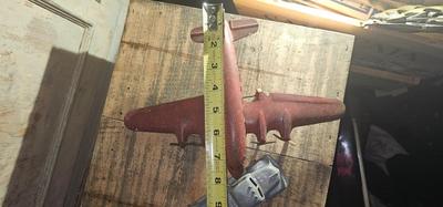 Vintage pressed metal toy truck and Marx airplane