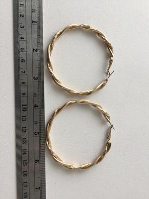 Unmarked gold tone statement hoop earrings